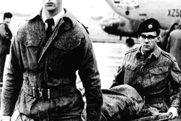 Irish Soldiers carry a victim of the Air India Flight 182 Bombing after the plane went down off the coast of Ireland