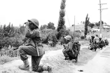 Indian troops securing areas in Kashmir at the end of Operation Grand Slam