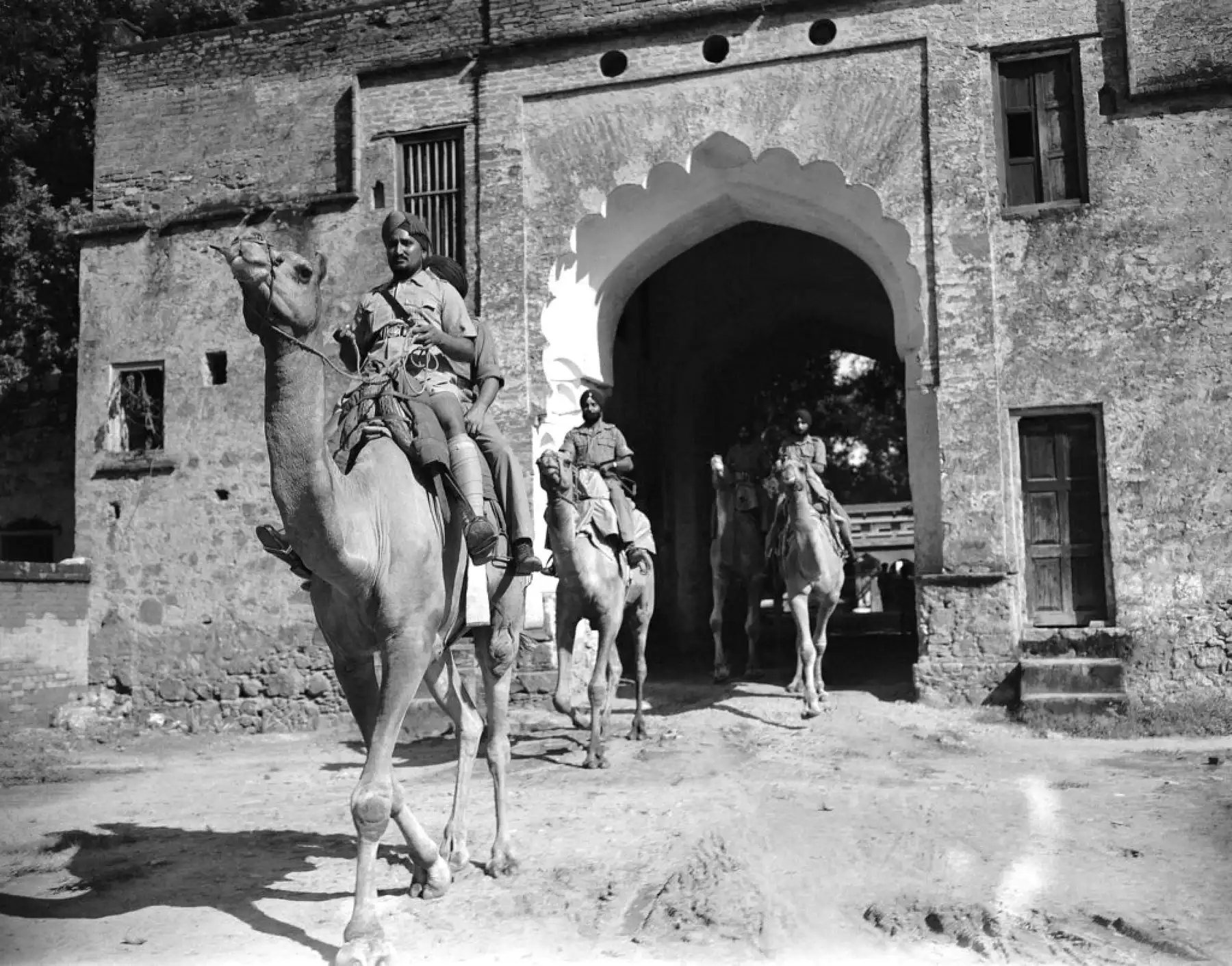 Camel mounted soldiers of the 1st Battalion, Sikh Regiment on patrol in Gurgaon, India