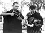 The Panchen Lama and Dalai Lama set up their film cameras before entering the Elephanta Caves in Bombay, India